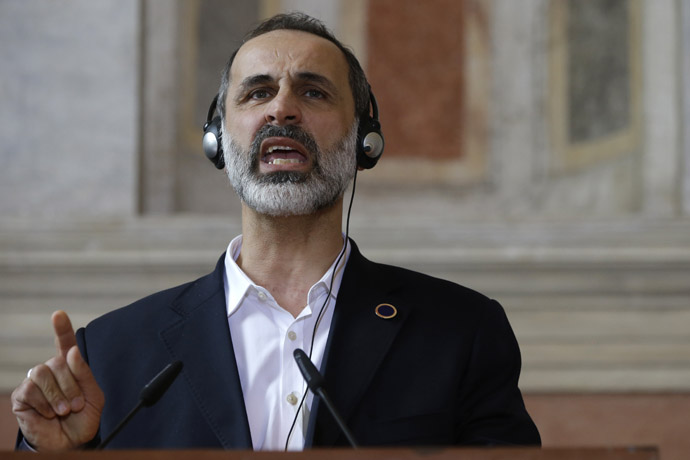 Syrian National Coalition President Mouaz al-Khatib speaks eduring a joint press conference at the end of a meeting of the "Friends of the Syrian People (FOSP) Ministerial" group on February 28, 2013 in Rome. (AFP Photo/Jaquelyn Martin)