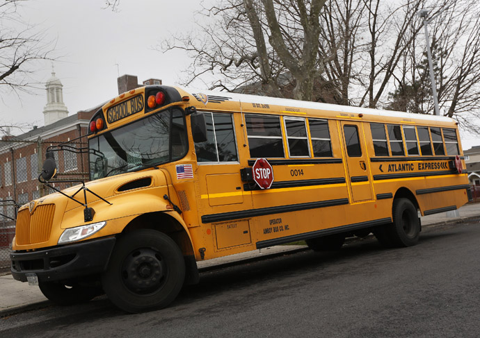 A school bus used for transporting New York City public school students is seen parked in front of a school in the Queens borough of New York January 15, 2013. (Reuters/Shannon Stapleton)