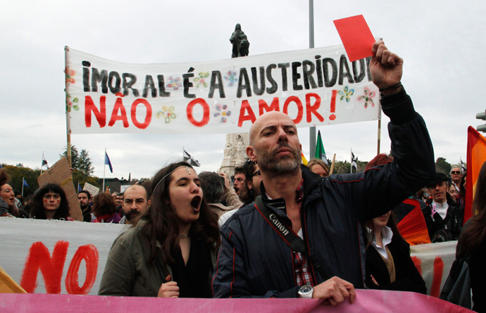 Demostrators shout while taking part in a march against government austerity policies in Lisbon March 2, 2013 (Reuters / Hugo Correia)