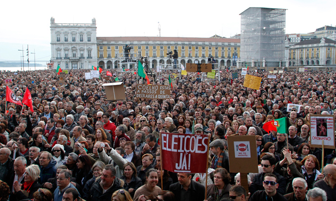 People gather to protest against government austerity policies at Lisbon's main square Praca do Comercio March 2, 2013 (Reuters / Hugo Correia)