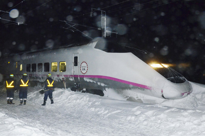 Derailed Akita Shinkansen train is seen in Daisen, Akita prefecture, in this photo taken by Kyodo March 2, 2013. (Reuters/Kyodo)