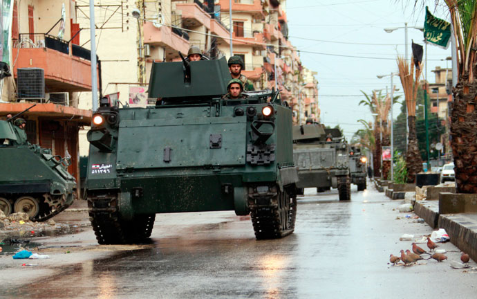 Lebanese Army soldiers patrol the Sunni Muslim Bab al-Tebbaneh neighbourhood in Tripoli, northern Lebanon.(AFP Photo / Omar Ibrahim)
