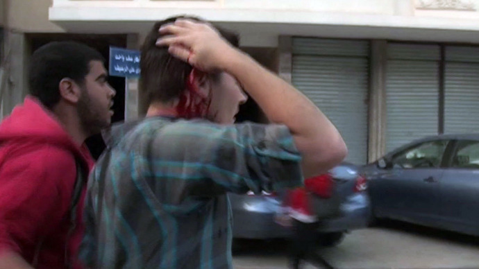 RT cameraman beaten as Morsi supporters attack protesters (VIDEO)