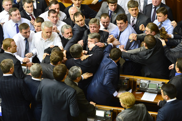 Ukrainian deputies scuffle during a session in the national Parliament in Kiev March 19, 2013. (Reuters)