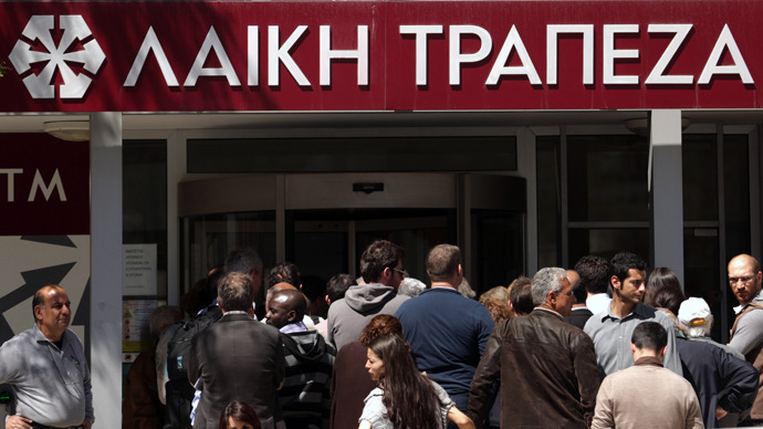 President slashes own wages as Cypriots face €300 daily cash limit