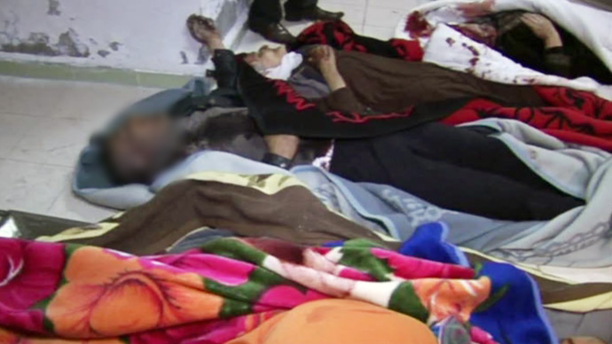 RT footage screenshot. Image blurred due to graphic content.