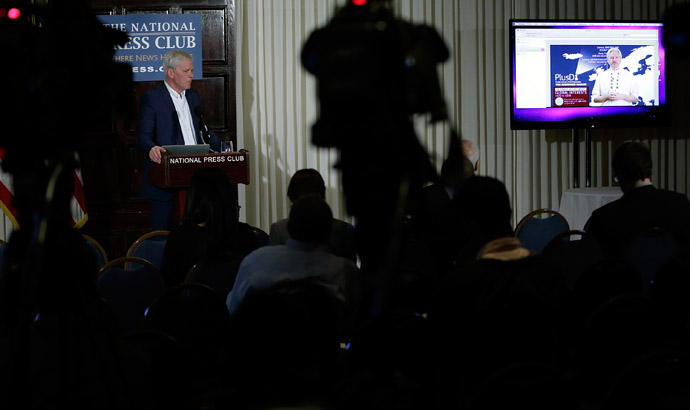 WikiLeaks spokesperson Kristinn Hrafnsson (L) appears at a press conference with Wikileaks founder Julian Assange (R), via teleconference, April 8, 2013 in Washington, DC. (Win McNamee/Getty Images/AFP)