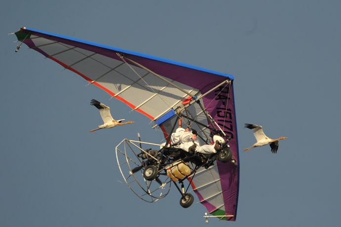 In the sky: a motorized hang glider with Russian President Vladimir Putin at the controls (RIA Novosti / Alexsey Druginyn)