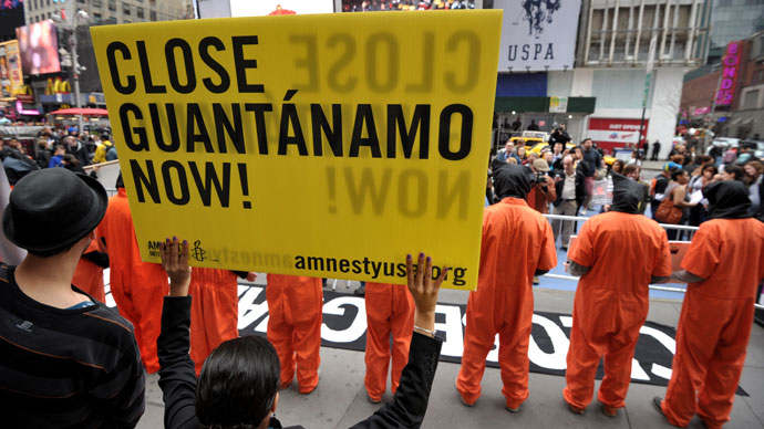 Activists demand the closing of the US military's detention facility in Guantanamo during a protest, part of the Nationwide for Guantanamo Day of Action, April 11, 2013 .(AFP Photo / Stan Honda)
