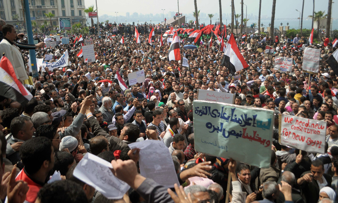 Egyptian pro-democracy activists gather in the coastal city of Alexandria on April 1, 2011 during a protest calling for the trial of ousted president Hosni Mubarak and to pressure the current government to pursue political reforms (AFP Photo / STR)