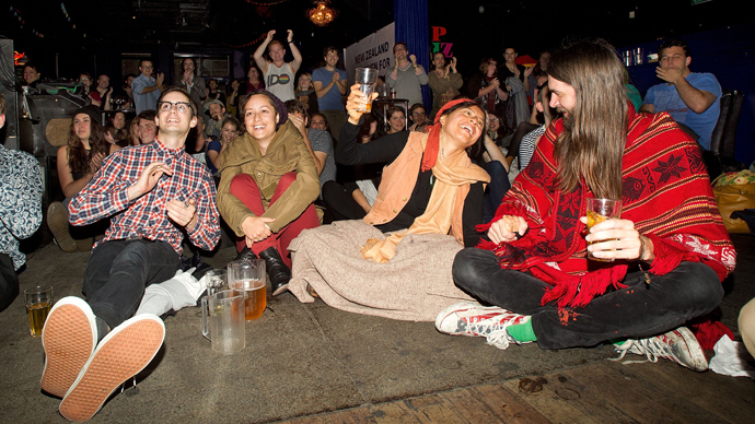 Gay-rights supporters celebrate at the San Francisco Bath House bar in Wellington on April 17, 2013 after New Zealand became the first Asia-Pacific country to legalise same-sex marriage after a decades-long campaign (AFP Photo / Marty Malville)