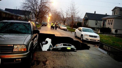 Giant sinkhole swallows up old mine in Russia's Urals (PHOTOS)