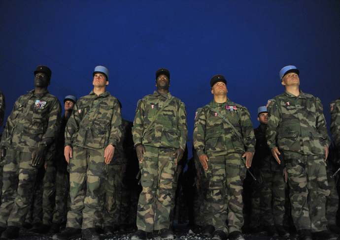 French soldiers with the NATO-led International Security Assistance Force (ISAF) stand during a departure ceremony at the French base in Surobi district in Kabul province on March 18, 2012 (AFP Photo / Shah Marai)