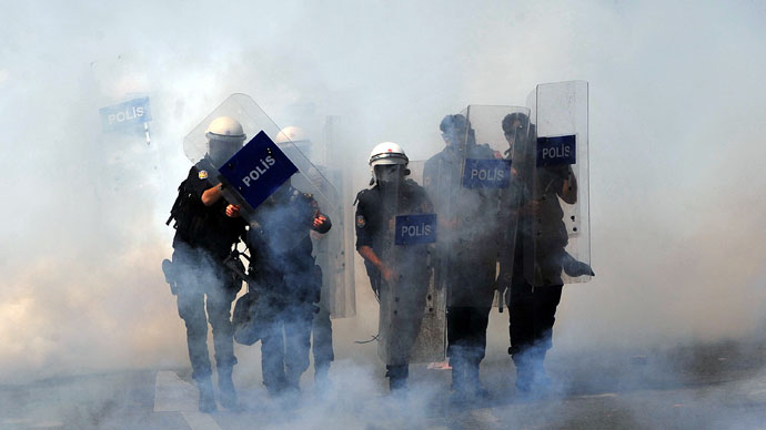 May Day Mayhem In Seattle: Police Mace And Fire Flash Bang Grenades At 