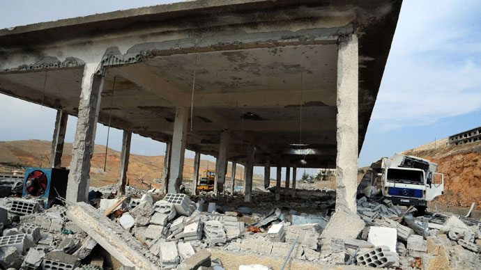 The damage caused by an Israeli strike according to SANA. Israel carried out a pre-dawn air strike near Damascus on May 5, targeting Iranian missiles destined for Lebanon's Hezbollah in the second such raid on Syria in three days, a senior Israeli source said. (AFP Photo / SANA )