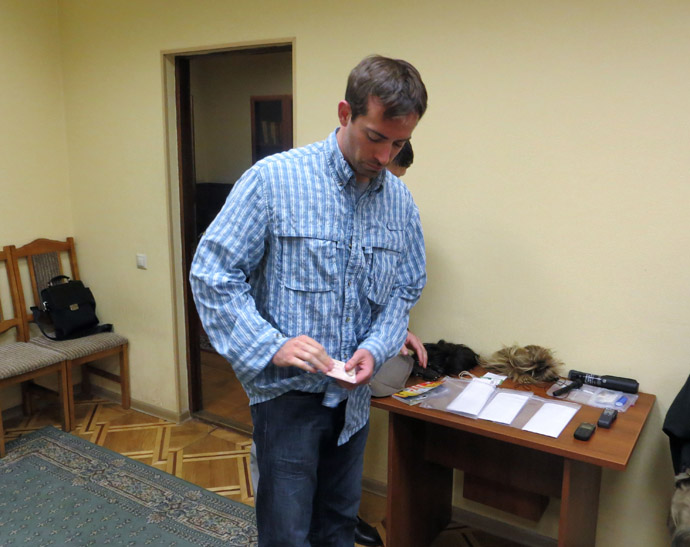 Ryan Christopher Fogle, third secretary of the Moscow US embassy's political department, seen at the Federal Security Service's reception office, on having been detained after making an attempt to recruit an employee of one of the Russian secret services. (RIA Novosti/FSS)