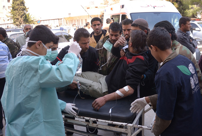 In this image made available by the Syrian News Agency (SANA) on March 19, 2013, a man is brought to a hospital in the Khan al-Assal region in the northern Aleppo province, as Syria's government accused rebel forces of using chemical weapons for the first time (AFP Photo)