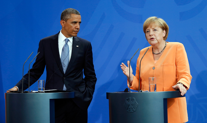 U.S. President Barack Obama and German Chancellor Angela Merkel hold a joint news conference at the Chancellery in Berlin June 19, 2013 (Reuters / Kevin Lamarque)