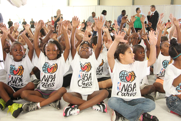 Kids celebrate being at the 2013 NBA Finals Legacy Project as part of the 2013 NBA Finals on June 7, 2013 at the Joe Celestin Center in Miami, Florida (NBAE Nathaniel S. Butler / NBAE via Getty Images / AFP)