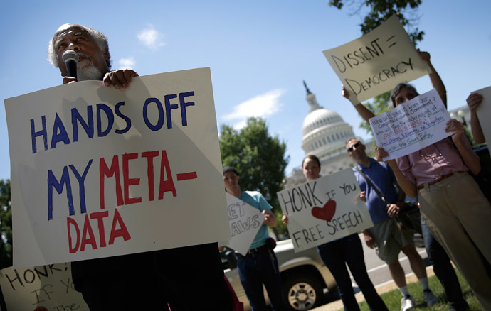 Kwazi Nkrumah speaks while joining protesters rallying outside the U.S. Capitol against the NSA's recently detailed surveillance programs June 13, 2013 in Washington, DC. (Win McNamee/Getty Images/AFP)