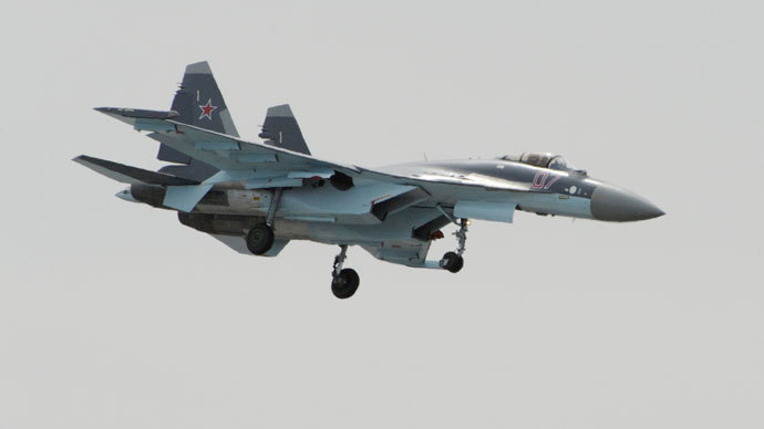 The Russian-made Sukhoi SU-35 military jet lands after its preparation flying display at Le Bourget on June 16, 2013.(AFP Photo / Eric Feferberg)