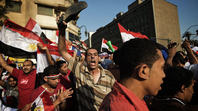 Egyptian opposition protesters celebrate on July 1, 2013 in Cairo.(AFP Photo / Gianluigi Guercia)