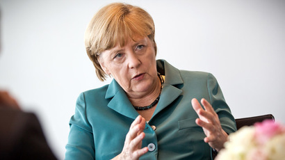 Writing on the wall? 'United Stasi of America' artist under police scrutiny