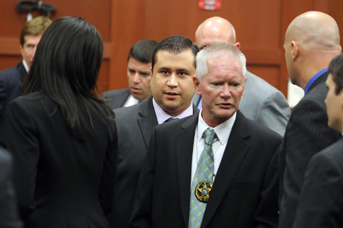 George Zimmerman leaves the courtroom a free man after being found not guilty, on the 25th day of his trial at the Seminole County Criminal Justice Center July 13, 2013 in Sanford, Florida (AFP Photo / Joe Burbank)