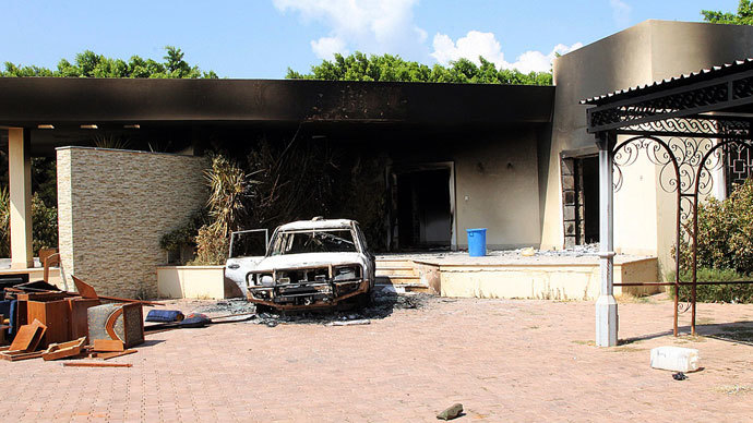 A burnt house and a car are seen inside the US Embassy compound on September 12, 2012 in Benghazi, Libya following an overnight attack on the building. The US ambassador to Libya and three of his colleagues were killed in an attack on the US consulate in the eastern Libyan city by Islamists outraged over an amateur American-made Internet video mocking Islam, less than six months after being appointed to his post.(AFP Photo / Stringer)