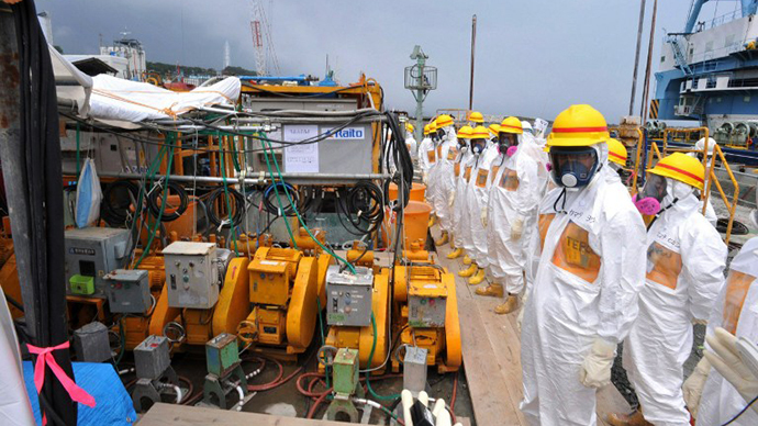 This photo taken on August 6, 2013 shows local government officials and nuclear experts inspecting a facility to prevent seeping of contamination water into the sea at Tokyo Electric Power's (TEPCO) Fukushima Dai-ichi nuclear plant in Okuma, Fukushima prefecture. (AFP Photo)