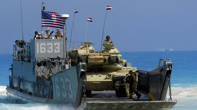 Obama scraps Egypt military drill after crackdown, keeps aid intact