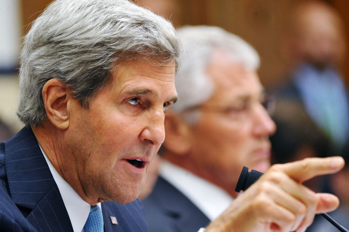 US Secretary of State John Kerry (L) speaks as US Defense Secretary Chuck Hagel (R) watches while testifying on Syria to the House Armed Services Committee on September 10, 2013 in the Rayburn House Office Building on Capitol Hill in Washington, DC.(AFP Photo / Mandel Ngan)