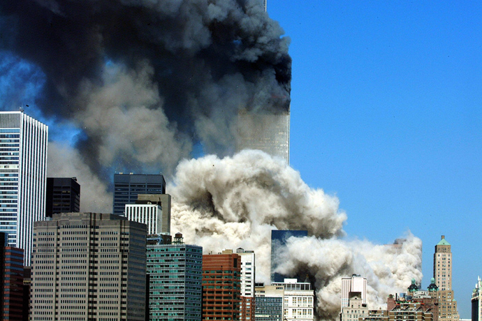 This 11 September, 2001 file photo shows smoke billowing up after the first of the two towers of the World Trade Center collapses in New York City (AFP Photo / Files / Henny Ray Abrams)
