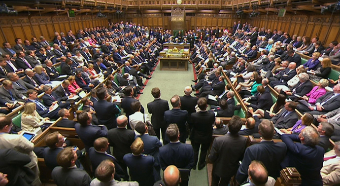 Members of Parliament are seen attending a session of Parliament in the House of Commons in London (Reuters / UK Parliament via Reuters TV)