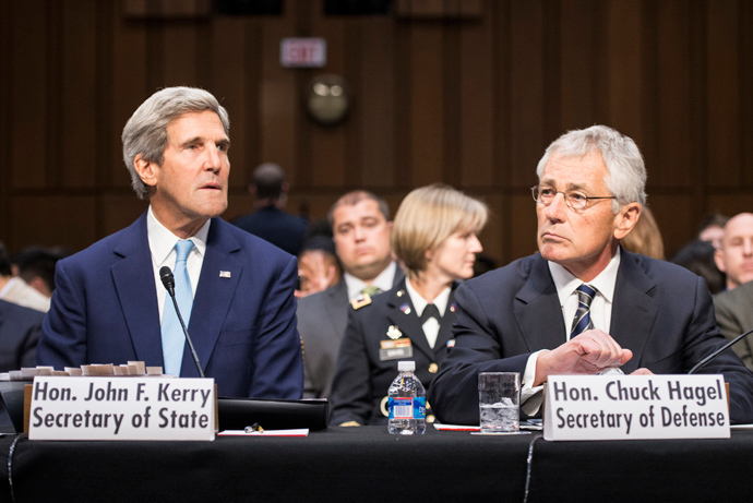 US Secretary of State John Kerry and US Secretary of Defense Chuck Hagel listen during a hearing of the Senate Foreign Relations Committee on Capitol Hill September 3, 2013 in Washington, DC (AFP Photo / Brendan Smialowski)