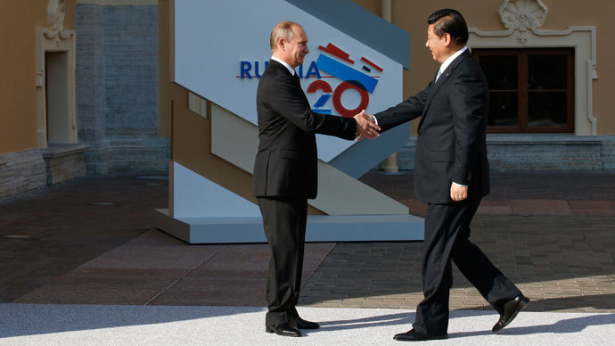 China sides with Russia in opposing military strikes on Syria, warns of oil price surge
