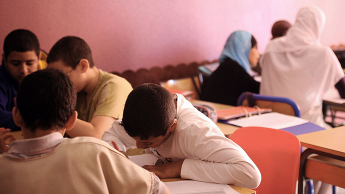 Pupils attend a lesson in a classroom on May 11, 2011 at the Alif private muslim school in the French southwestern city of Toulouse.(AFP Photo / Eric Cabanis)