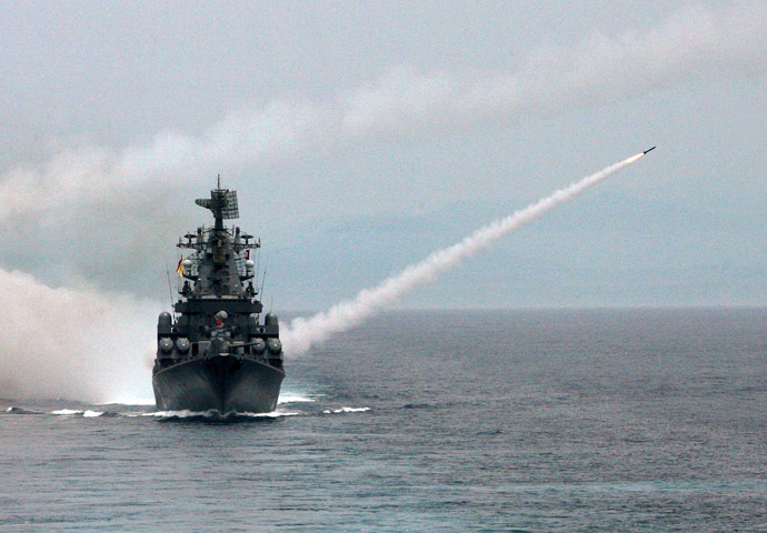 Missile cruiser "Moskva" belonging to Russia's Black Sea Fleet firing anti-aircraft missiles during joint drills with other fleets. (RIA Novosti/Vitaliy Ankov)
