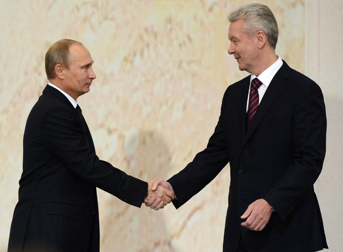 Russian President Vladimir Putin, left, congratulates Sergei Sobyanin at his official inauguration as Moscow Mayor, at the Museum of the Great Patriotic War on Poklonnaya Hill. (RIA Novosti/Alexey Filippov)