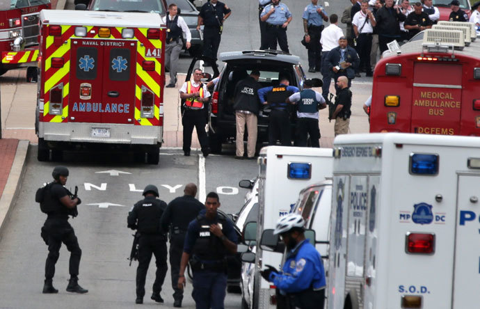 Emergency vehicles and law enforcement personnel respond to a reported shooting at an entrance to the Washington Navy Yard September 16, 2013 in Washington, DC.(AFP Photo / Alex Wong)