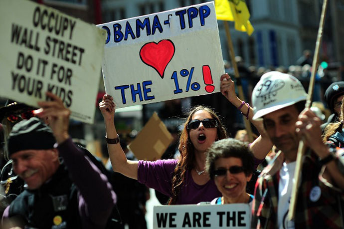 Occupy Wall Street participants take part in a protest to mark the movement's second anniversary in New York, September 17, 2013. (AFP Photo / Emmanuel Dunand)