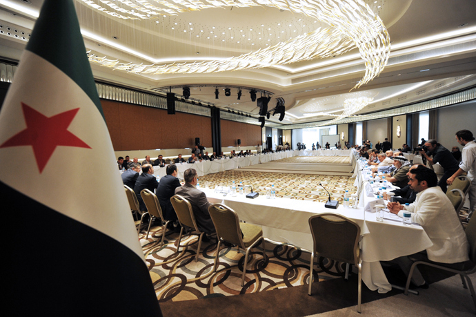 Members of Syrian National coalition (SNC) attend a meeting of the National Coalition of Syrian Revolution and Opposition forces in Istanbul (AFP Photo / Ozan Kose)