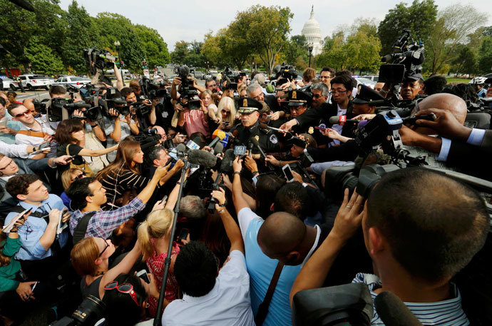 U.S. Capitol Police Chief Kim Dine (C) speaks to the media after a shooting near the U.S. Capitol in Washington, October 3, 2013. The U.S.(Reuters / Larry Downing)