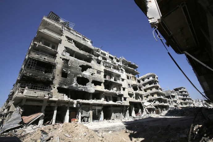 A picture taken on July 31, 2013 shows a devastated street in the Khalidiyah district of Syria's central city of Homs. (AFP Photo/Joseph Eid)