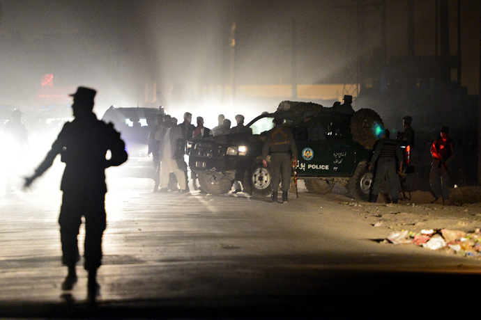 Afghanistan police walk at the site of an attack on foreign troops in Kabul on October 18, 2013 (AFP Photo / Massoud Hossaini) 