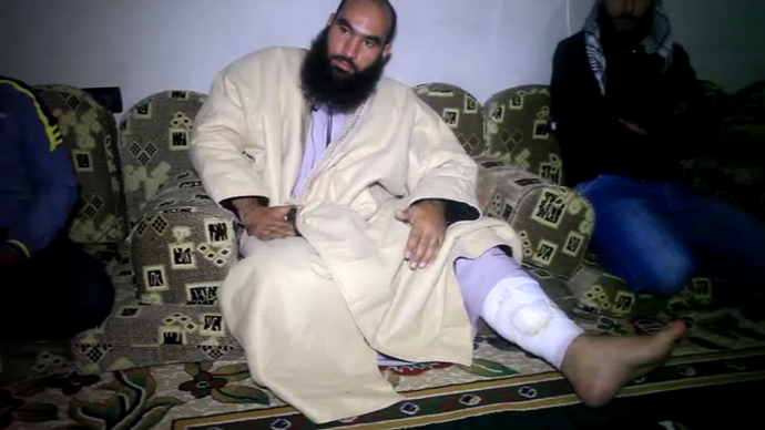 Free Syrian Army militants, Abu Mohammad, who was injured during a battle for Maaloula. (Still from RT video)