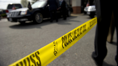 Vigil for teen found shot in police car ends with tear gas, arrests