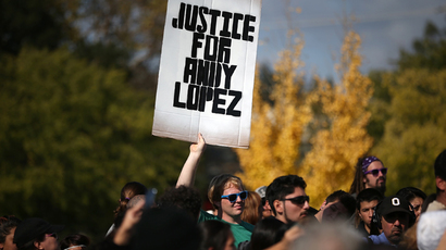 Vigil for teen found shot in police car ends with tear gas, arrests