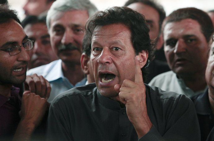 Imran Khan, (C) Pakistani cricketer-turned-politician and chairman of the Pakistan Tehreek-e-Insaf (PTI) political party (Reuters / Faisal Mahmood)