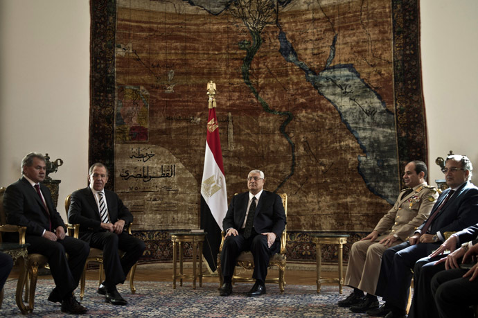 Egyptâs interim president Adly Mansour (C) defense minister Abdlefatah al-Sissi (2ndR) meet with Russian Foreign Minister Sergey Lavrov (2-L), and Russian Defense Minister Sergei Shoigu (L) on November 14, 2013 at the presidential palace in Cairo. (AFP Photo/Khaled Desouki)